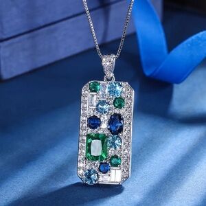 SAPPHIRE & EMERALD PENDANT ON SILVER BOX CHAIN